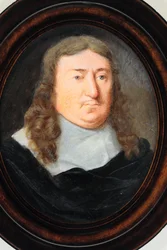 Ein Herr im schwarzen Mantel